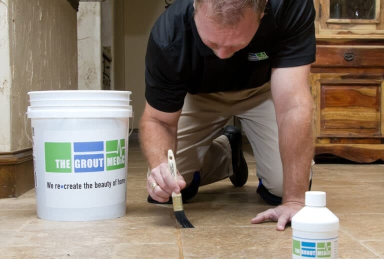 Professional Applying Grout Sealer